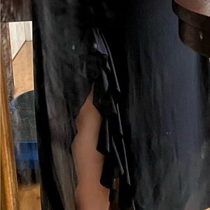 Black, ruched skirt with slit and bow